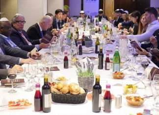 Foreign ambassadors break matzah in Israel two weeks before Passover