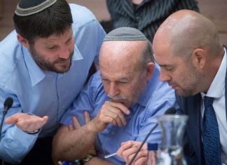 Complete Text of the Controversial Nationality Bill approved for second and third Knesset readings Committee chairman Amir Ohana (right) with Jewish Home parliament members Nissam Slomiansky (center) and Bezalel Smotrich at the joint Knesset and Constitution Committee meeting discussing the proposed National Law at the Knesset, July 16, 2018. Photo by Miriam Alster/Flash90.