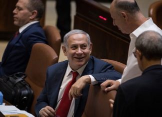 Amid nation-state law controversy, Netanyahu urges lawmakers to ‘fight for the truth’ Israeli Prime Minister Benjamin Netanyahu attends the Knesset Plenary Hall session ahead of the vote on the Nationality Law, which will enforce the foundation of the State of Israel as the state of the Jewish people, on July 18, 2018. Photo by Hadas Parush/Flash90.