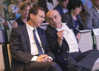 Heed the lessons of Natan Sharansky Isaac Herzog, left, speaks with outgoing Jewish Agency chairman Natan Sharansky following Herzog’s election as the next chairman at the Jewish Agency Board of Governors’ meetings in Jerusalem on June 24, 2018. Photo credit: Nir Kafri/The Jewish Agency for Israel.