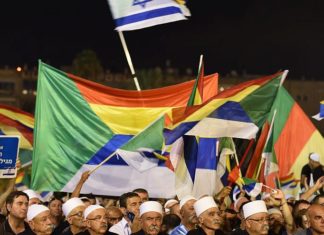 Druze remain seriously upset about nation-state law, ‘increases potential for conflict’ Israeli Druze attend a Druze-led rally to protest against the 'Jewish Nation-State law' in Rabin Square, Tel Aviv on Aug. 04, 2018. Tens of thousands of Israeli Druze and their supporters gathered in Tel Aviv on Saturday night to protest against the 'Jewish Nation-State' law. Photo by Gili Yaari /FLASH90