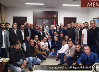 Fatah, PA headed by Abbas praise terrorists, provide housing for families of martyrs 'Abbas, center, meeting with released prisoners who served 15-year sentences in Israeli prisons (image: Facebook.com/President.Mahmoud.Abbas, April 22, 2018)-MEMRI