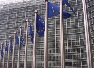 European Union makes move to combat anti-Semitism European Union flags in front of the European Commission building in Brussels. Credit: Amio Cajander via Wikimedia Commons.