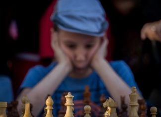 FIDE cancels chess contest in Riyadh after legal action A young Israeli chess player takes part in a special chess tournament in Jerusalem marking Israel’s 70th anniversary, April 30, 2018. Photo by Yonatan Sindel/Flash90.