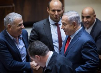 Netanyahu engaged in last-ditch effort to save coalition, as early Israeli elections loom Israeli Prime Minister Benjamin Netanyahu at a plenum session in the Israeli parliament on March 13, 2018. Credit: Hadas Parush/Flash90.