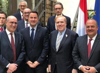 Holocaust-era property compensation discussed with Luxembourg’s prime minister Front row (from left): Gideon Taylor, chair of operations, WJRO; Xavier Bettel, Prime Minister of Luxembourg; Randy Evans, U.S. Ambassador to Luxembourg; and Tom Yazdgerdi, U.S. Special Envoy for Holocaust Issues. Second row (front): Evan Hochberg, director of international affairs, WJRO; Albert Aflalo, president, Consistoire Israélite Luxembourg; Franҫois Moyse, president, Foundation Luxembourgeoise de la Mémoire Shoah. Back row (from left): Wesley Fisher, director of research, WJRO. Credit: WJRO.