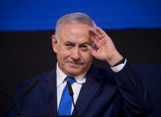 Rivlin says he will ask Netanyahu to form government Likud members and supporters celebrate Israel's election results at party headquarters in Tel Aviv on April 9, 2019. Photo by Yonatan Sindel/Flash90.