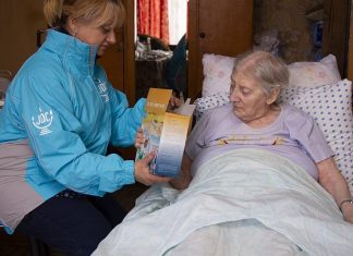 JDC provides tons of matzah, Passover kit and activities, holds seders worldwide Continuing JDC’s long-held tradition of matzah delivery for Passover, a volunteer provides matzah to elderly client in Odessa, Ukraine. Credit: Courtesy.