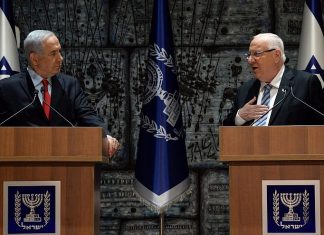 Rivlin officially tasks Netanyahu with forming next government Israeli President Reuven Rivlin (right) tasks Israeli Prime Minister Benjamin Netanyahu (left) on April 17, 2019, with forming a government coalition. Credit: Haim Zach/GPO.