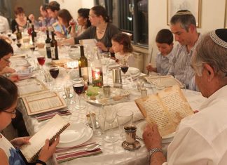 Bubbe’s Passover, circa 2019: Feeding the soul while keeping the body healthy An Israeli family during the Passover seder on the first night of the holiday in Tzur Hadassah. Credit: Nati Shohat/Flash90.