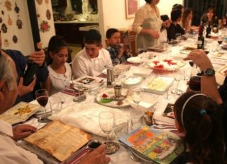 Hot for the holiday: Passover gets more interesting every year A family seen during the Passover seder on the first night of the holiday in Tzur Hadassah, Israel, on March 25, 2013. Diaspora Jews observe two seders each year, as opposed to one seder per year in Israel. Credit: Nati Shohat/Flash90.