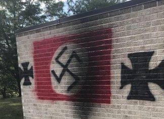 Man sentenced to three years in prison for vandalism at Indiana synagogue A Nazi swastika and iron crosses spray-painted on Congregation Shaarey Tefilla in Carmel, Ind. Credit: Debby Barton Grant via Facebook.