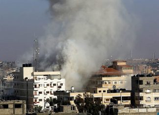Report: Islamic Jihad responsible for death of mother and baby Smoke rises following an Israeli airstrike in Rafah in the southern Gaza Strip on May 5, 2019. Credit: Abed Rahim Khatib/Flash90