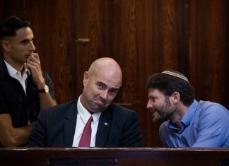 Interim ministers provoke controversy prior to second round of Israeli elections Then-Jewish Home MK Bezalel Smotrich with Likud MK Amir Ohana during a special Plenary Hall session at the Knesset in Jerusalem on Aug. 8, 2018. Photo by Yonatan Sindel/Flash90.