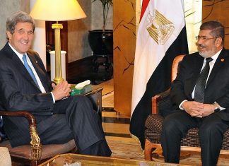 Mohamed Morsi and the dangerous lessons of the Arab Spring Former U.S. Secretary of State John Kerry meeting with former Egyptian President Mohamad Morsi in 2013. Credit: Wikimedia Commons.