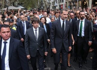 An Iranian lie unfolds in the Spanish media King Felipe VI of Spain (center), accompanied by Catalonia President Carles Puigdemont (left) and Barcelona Mayor Ada Colau, prepare to lay a wreath at the site of a truck-ramming attack two days earlier on La Rambla that left two people dead and more than 100 wounded, Aug. 19, 2017. Credit: Wikimedia Commons.