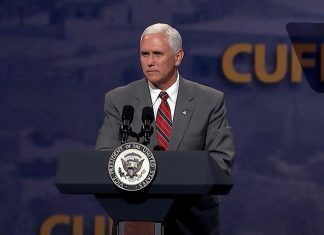 Pence to attend Yad Vashem event marking 75th year of liberation of Auschwitz U.S. Vice President Mike Pence addresses attendees at the annual CUFI conference, July 8, 2019. Credit: CUFI.