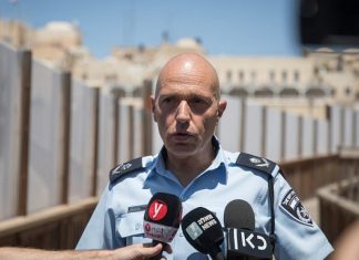 Arab countries blast Israel over Tisha B’Av Temple Mount clashes Jerusalem District Police Commander Doron Yedid speaks with media at the Mughrabi Bridge in the Old City of Jerusalem after clashes broke out on the Temple Mount, on August 11, 2019. Photo by Hadas Parush/Flash90.