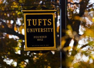 Tufts student discovers swastika attached to door A Tufts University sign at the intersection of College Avenue and Professors Row on Nov. 4, 2015. Photo by Alonso Nichols/Tufts University.