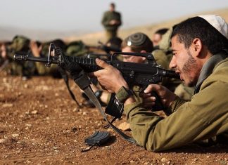 Navigating fine line between Torah observance and Israeli military service, politics aside Israeli soldiers in the Nahal Haredi unit seen during a shooting exercise at the Peles Military Base in the northern Jordan Valley. Photo by Yaakov Naumi/Flash90.