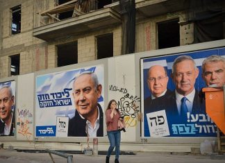 Gantz’s ‘internal war’ rhetoric is insulting and dangerous Election campaign posters in Tel Aviv depict Israeli Prime Minister Benjamin Netanyahu, head of the Likud Party, as well as the leaders of the Blue and White Party, including Benny Gantz, second from left, Sept. 2019. Photo by Adam Shuldman/Flash90.