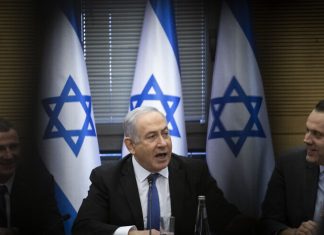 Facing legal uncertainty, can Netanyahu run for prime minister? Prime Minister Benjamin Netanyahu during a meeting of the Right-wing parties bloc at the Knesset, the Israeli parliament in Jerusalem on November 20, 2019. Photo by Hadas Parush/Flash90