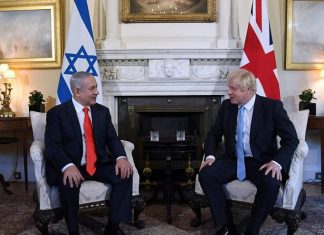 Boris Johnson’s government will pass anti-BDS law, says British official Prime Minister of the United Kingdom Boris Johnson and Israeli Prime Minister Benjamin Netanyahu in London on Sept. 5, 2019. Credit: Chaim Tzach/GPO.