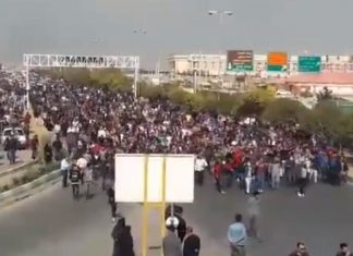 Leading 2020 presidential candidates voice support for Iranian protesters Protesters in the streets of Iran demonstrating against a massive hike in gas prices by the government, November 2019. Source: Screenshot.