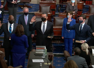 Jon Ossoff sworn in as first Jewish senator from Georgia Sen. Jon Ossoff (D-Ga.), bottom right, is sworn into office on Jan. 20, 2021. Source: Screenshot.