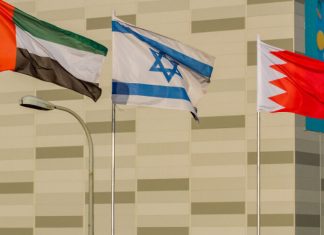 Biden decision on weapons sales to Gulf states ‘important test’ for Israeli-Sunni alliance The flags of the United States, the United Arab Emirates, Israel and Bahrain seen on the side of a road in the city of Netanya on Sept. 14, 2020. Photo by Flash90.
