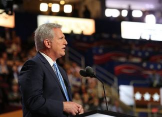 McCarthy decides not to remove Taylor Greene from House committee assignments Then-House Majority Leader Kevin McCarthy (R.-Calif.) speaks on day two of the 2016 RNC, July 19, 2016. Credit: Voice of America via Wikimedia Commons.