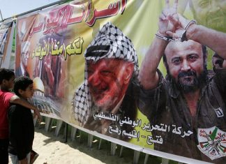 Marwan Barghouti to run against Mahmoud Abbas’s faction on separate ticket Palestinian children look at the image of PLO chief Yasser Arafat and terrorist Marwan Barghouti during a demonstration in the southern Gaza Strip calling for the release of prisoners held in Israeli jails on Oct. 6, 2011. Photo by Abed Rahim Khatib/Flash90.