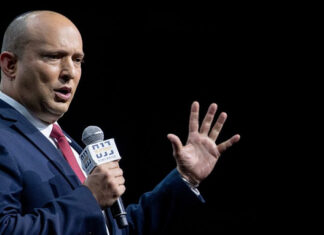 ‘Yes, we need change. But only the public will decide on its nature.’ Yamina leader Naftali Bennett at the annual Jerusalem Conference of the 'Besheva' group in Jerusalem, on March 15, 2021. Photo by Yonatan Sindel/Flash90.