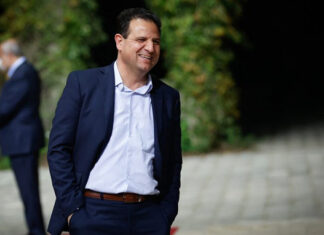 Joint Arab List head: ‘Intifada will end occupation, see Palestinian flag fly over Jerusalem’ Ayman Odeh, head of Israel's Joint Arab List party, arrives at the President's Residence in Jerusalem on April 5, 2021. Photo by Yonatan Sindel/Flash90.
