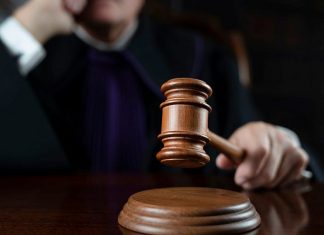 British court sentences Holocaust denier to prison time for ‘baiting Jews’ Illustrative photo of a judge. Credit: Zolnierek/Shutterstock.