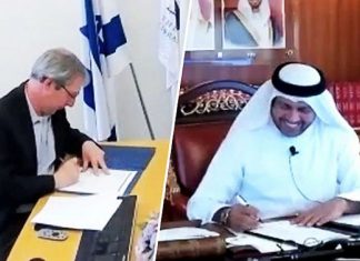 UAE National Archives, National Library of Israel ink historic agreement National Library of Israel director Oren Weinberg (left) and Abdulla M. Alraisi, director of the National Archive of the United Arab Emirates at Abu Dhabi, sign a memorandum of understanding laying out various areas of collaboration between the two institutions, Credit: National Library of Israel/UAE National Archive.