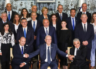 Nine ‘firsts’ you should know about Israel’s new government Israeli Prime Minister Naftali Bennett, Foreign Minister Yair Lapid, President Reuven Rivlin and ministers pose for a group photo of the country's 36th government, at the President's Residence in Jerusalem, June 14, 2021. Photo by Yonatan Sindel/Flash90.