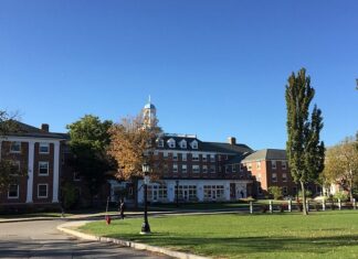 Tufts student wakes up on Shabbat to find mezuzah gone, groups lodge complaint Carmichael Hall in the Residence Quad at Tufts University in Medford, Mass. Credit: Wikimedia Commons.