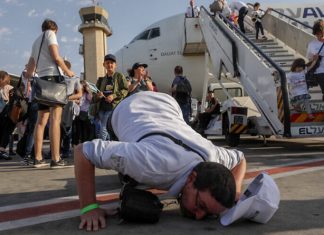 ‘Feeling part of the story’: Having made the move, ‘olim’ and Israel mark Aliyah Day The arrival of French Jews who made aliyah, at Ben Gurion International Airport on July 10, 2017. Photo by Nati Shohat/Flash90