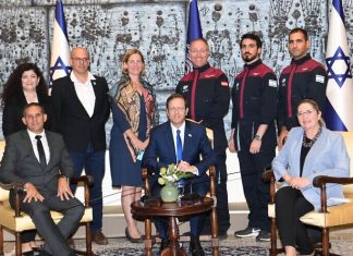 Herzog greets ‘graduates’ of Mars-simulation mission Israeli President Isaac Herzog, with analog astronauts of the AMADEE 20 Mars Simulation, at the President's Residence in Jerusalem on Nov. 2, 2021. Credit: Amos Ben-Gershom/GPO.