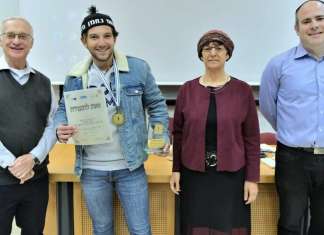Annual Physics Olympiad in Jerusalem cultivates ‘next generation of scientists’ From left: Professor Kenneth Hochberg, rector of the Jerusalem College of Technology; first-place winner Lael Dad from the Tamar Ariel School in Netanya; Shosh Nagar, director of Israel’s Education Ministry’s Religious Education Administration; and Benni Milgrom, academic coordinator of the Physics Olympiad and a lecturer of electronic engineering at the college. Photo by Avi Hayun.