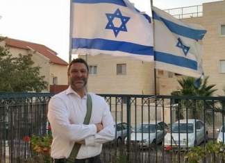 Court dismisses lawsuit brought by Ari Fuld’s family against Palestinian organizations Ari Fuld at his home in Efrat. Credit: Courtesy of Yishai Fleisher.