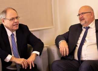 Yad Vashem chair urges Christian world to keep Holocaust Remembrance Day Yad Vashem chairman Dani Dayan, (left) speaks with Jürgen Bühler, president of the International Christian Embassy Jerusalem, during an online conference for pastors and clergy from around the world, January 2022. Credit: ICEJ.