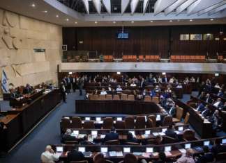 Family reunification bill for Palestinian spouses passes first reading in Knesset A discussion on the “family reunification law” during a plenum session in the Knesset on July 6, 2021. Photo by Yonatan Sindel/Flash90.