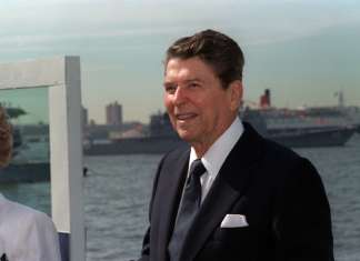 Coalition of the unwilling President Ronald Reagan visits the battleship USS IOWA (BB 61) during celebrations commemorating Independence Day and the unveiling of the Statue of Liberty.