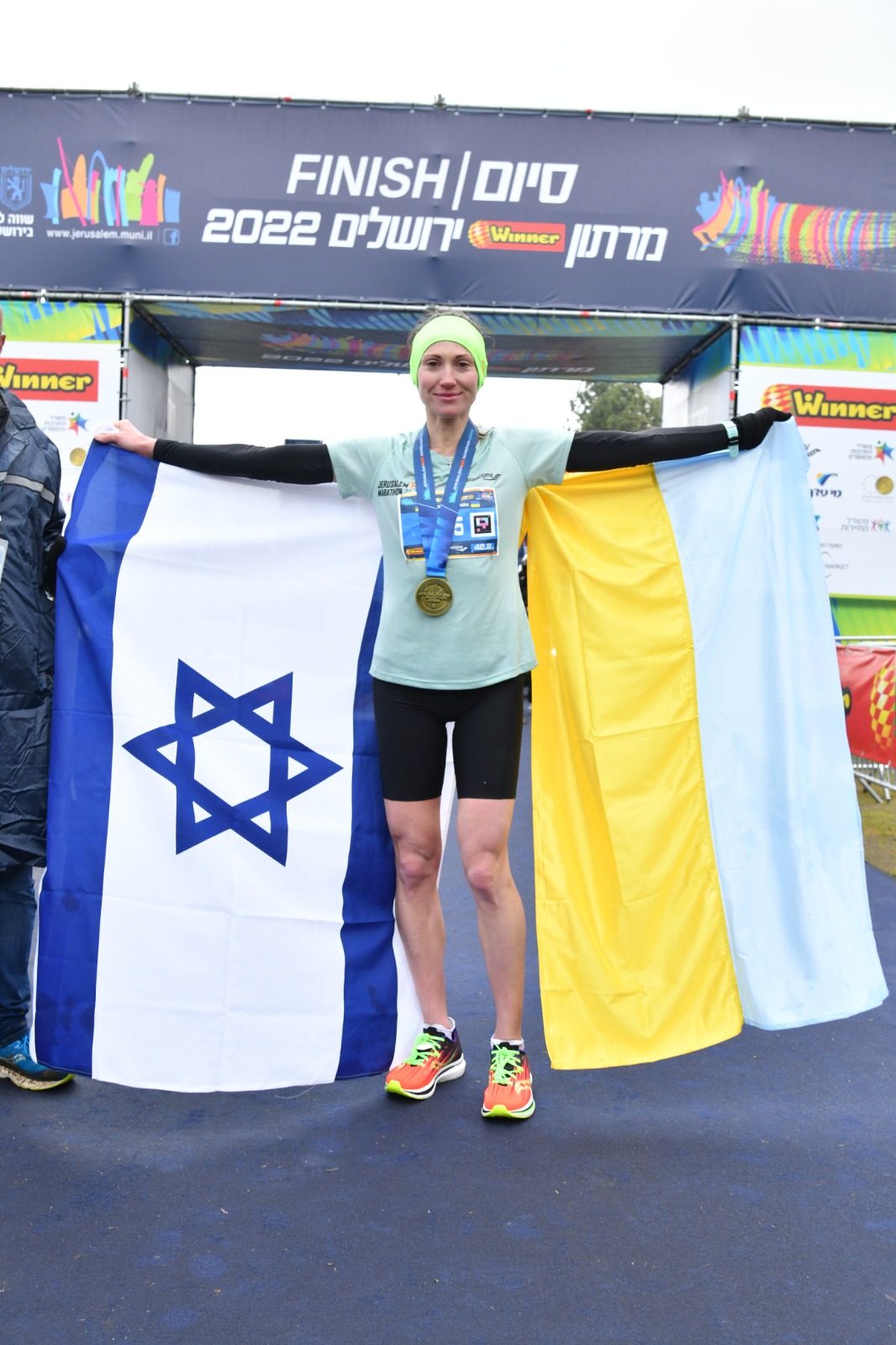 Ukrainian refugee Valentina Verzka won the Jerusalem Marathon on March 25, 2022. Credit: Sportphotography.