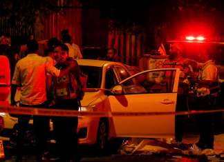 Terror attack in Elad on Yom Ha’atzmaut: Three murdered, four seriously wounded Israeli security and rescue personnel at the scene of a terrorist attack on Ibn Gvirol Street in Elad, east of Tel Aviv and near the city of Petach Tikvah, on Yom Ha'azmaut, Israel's Independence Day, May 5, 2022. Photo by Jamal Awad/Flash90.