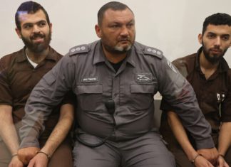 Two indicted for deadly Independence Day terror attack in Elad Assad Yosef Assad al-Fara'i and Tzabhi Imad Tzabhi Abu Shakir arrive in court for a hearing, in Lod, on June 9, 2022. Photo by Flash90.