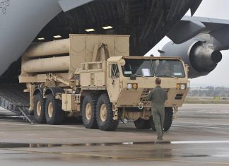 Biden administration approves large-scale military sales to Gulf states The Terminal High Altitude Area Defense (THAAD) mobile ballistic missile interception system being loaded by the U.S. Air Force for delivery to Israel. Credit: U.S. Army Europe.