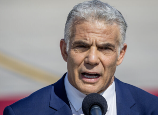 Lapid vows to amend Nation-State law if he remains premier after November